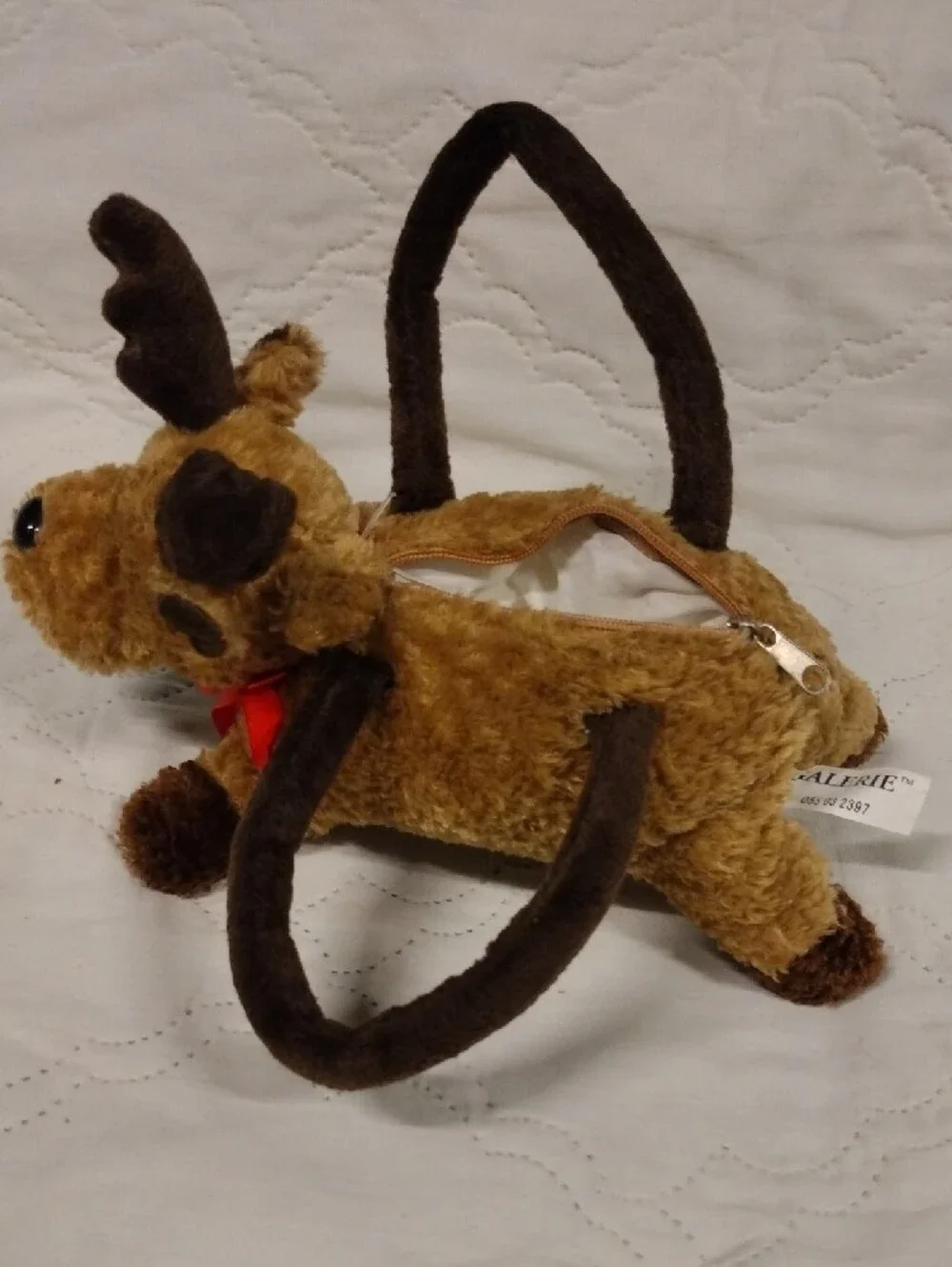 Galerie Reindeer Purse With A Red Ribbon